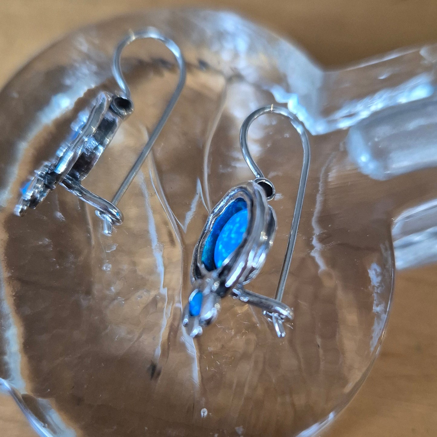 Bluenoemi Jewelry Earrings Sterling silver earrings set with opal. Flowers design.