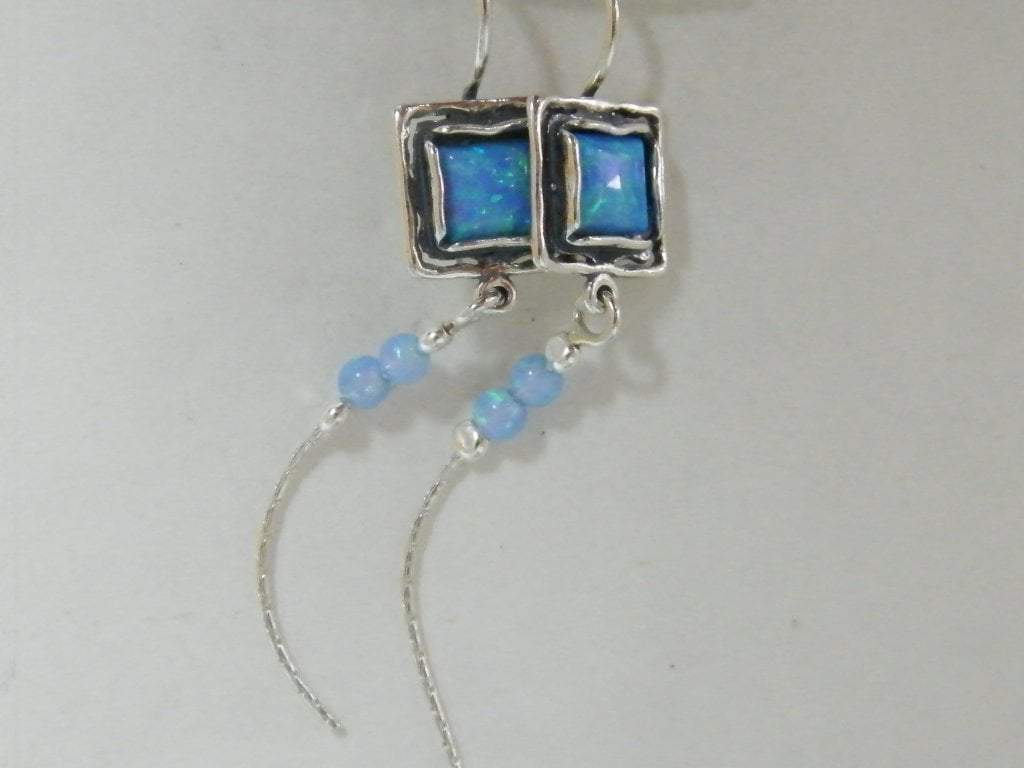 Bluenoemi Earrings Blue Bluenoemi Israel Jewelry Sterling Silver Earrings for Woman set with blue lab opals.