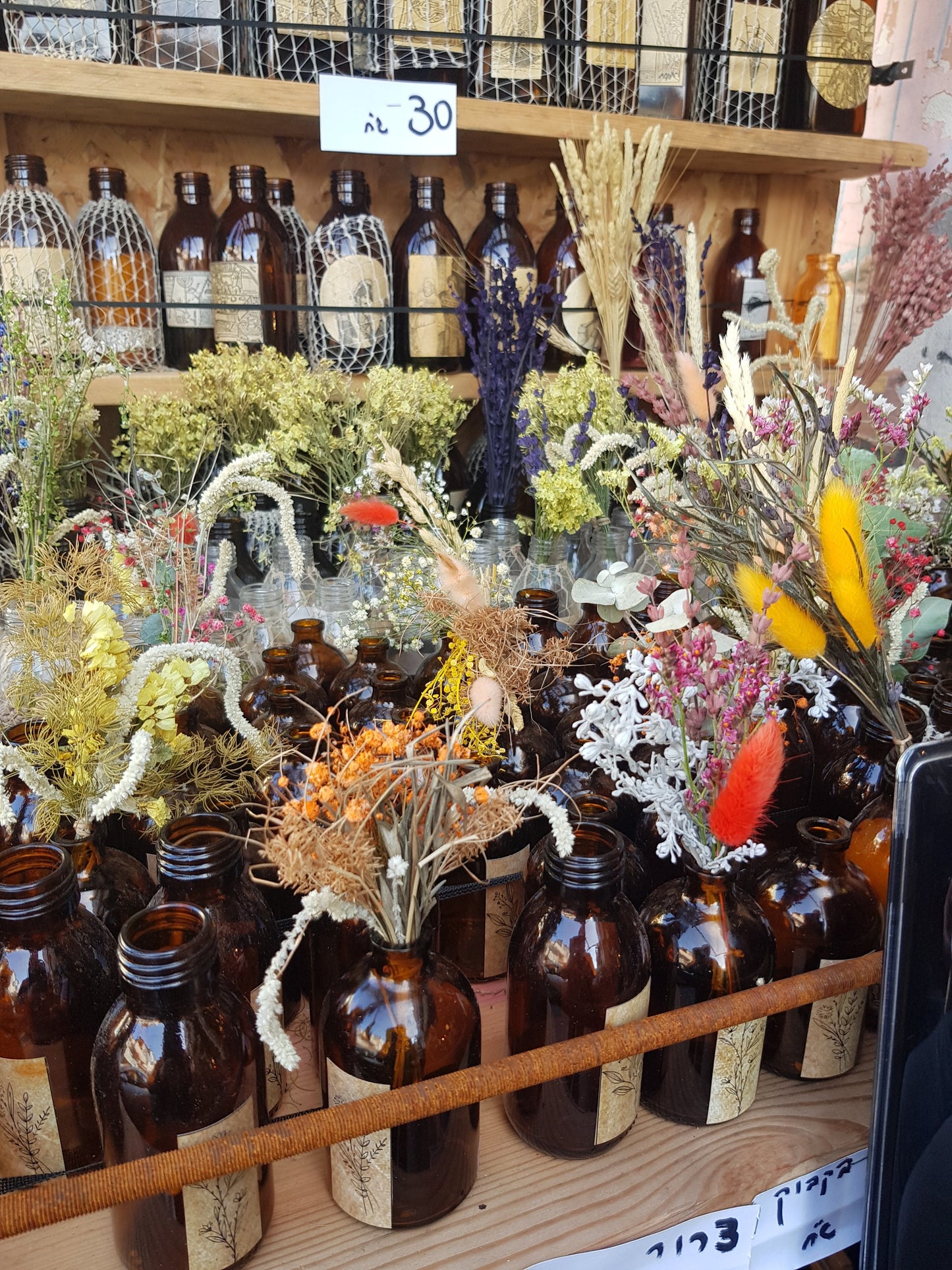 Dried flowers bouquet in a brown vintage glass bottle. - Bluenoemi