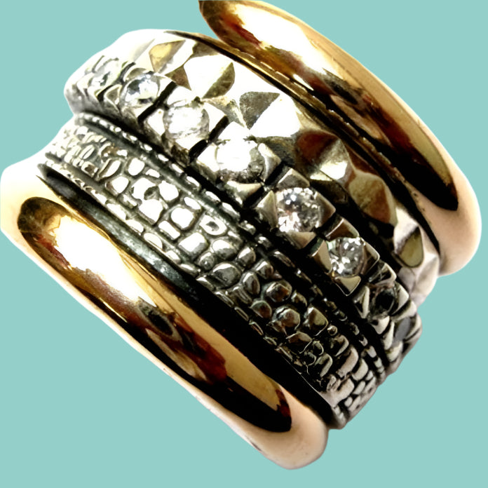 Bluenoemi Jewelry Spinner Ring Israeli meditation ring israeli jewelry spinner sterling silver gold & CZ zircons / garnets / opals.