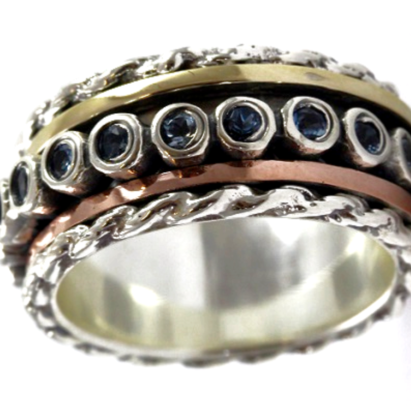Bluenoemi rings Spinner ring for woman set with green Tourmalines. Sterling silver and gold.