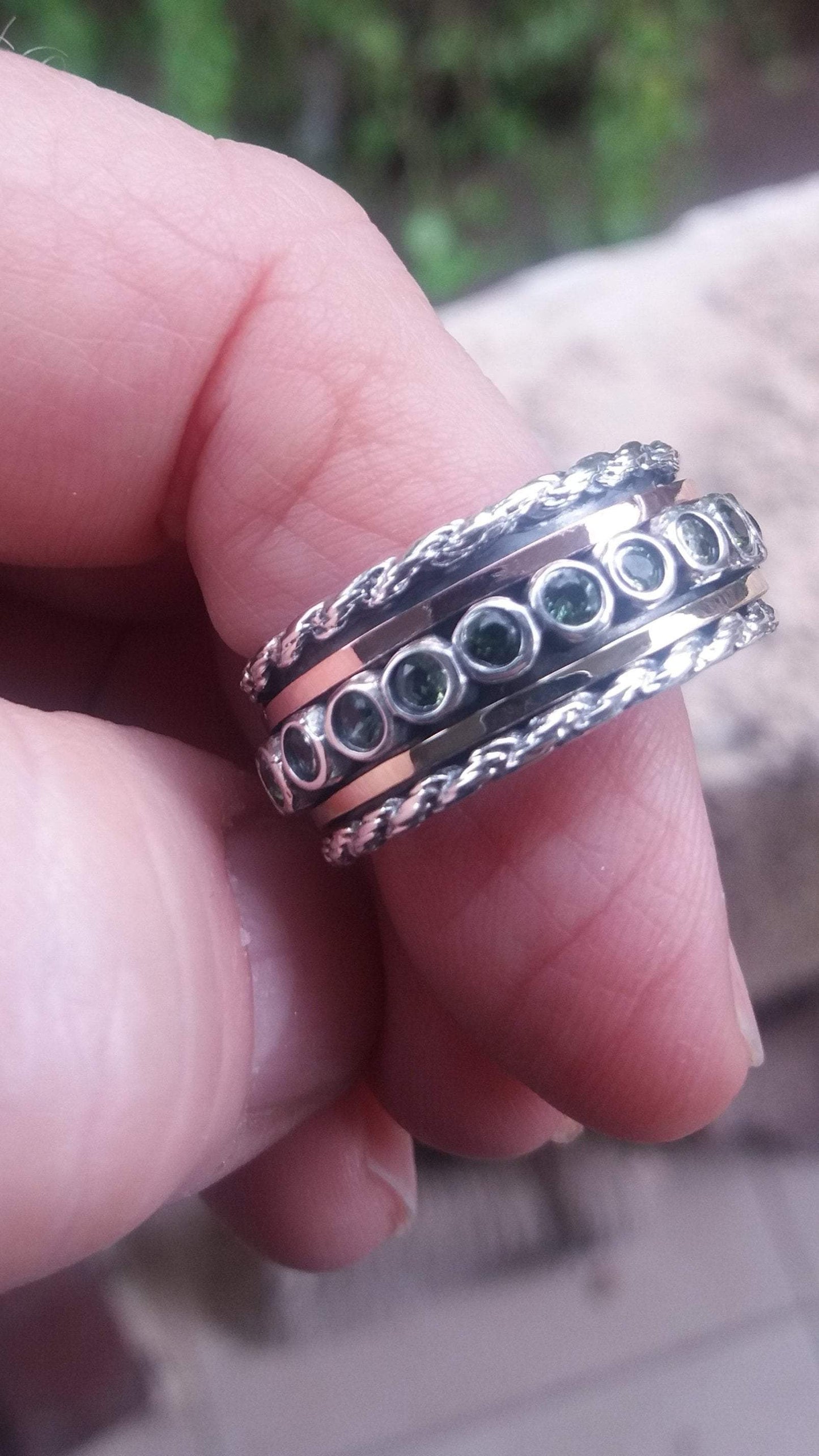 Bluenoemi rings Spinner ring for woman set with green Tourmalines. Sterling silver and gold.