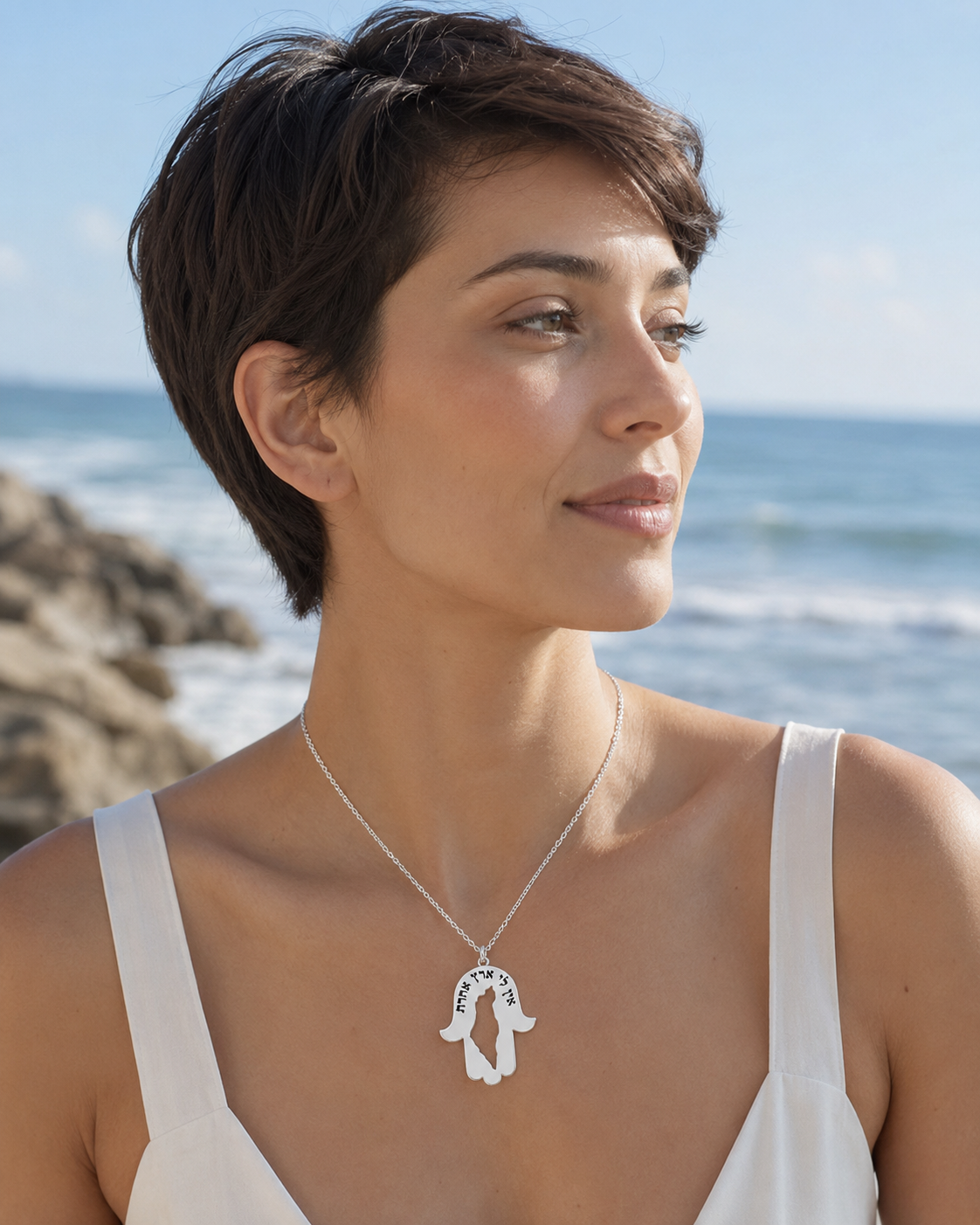 Woman wearing sterling silver Map of Israel necklace