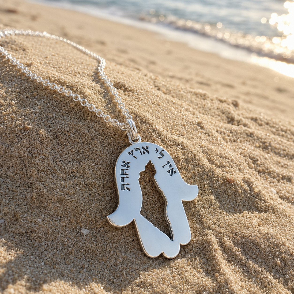 Map of Israel pendant photographed by the Tel Aviv sea