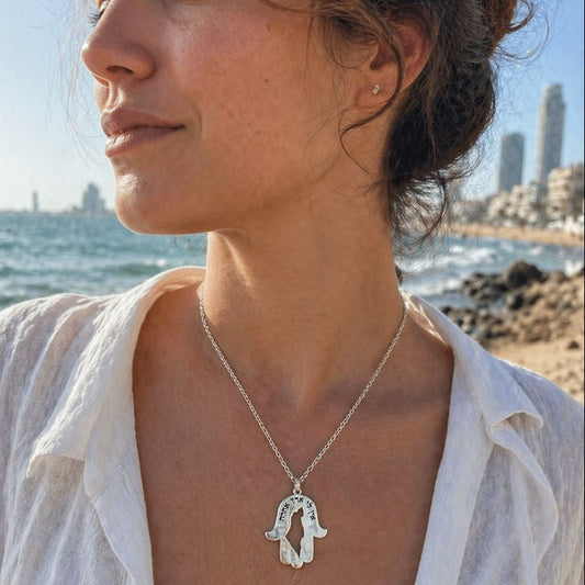 hamsa with the map of Israel in Tel Aviv  beach
