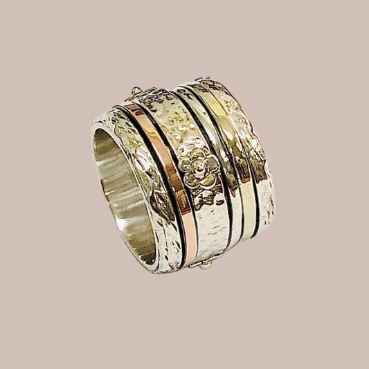 Silver and gold spinner ring handmade in Israel 