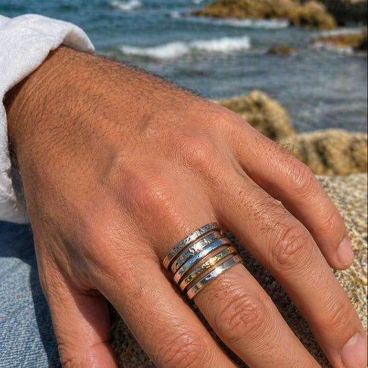 Hand with an Israeli spinner ring unisex
