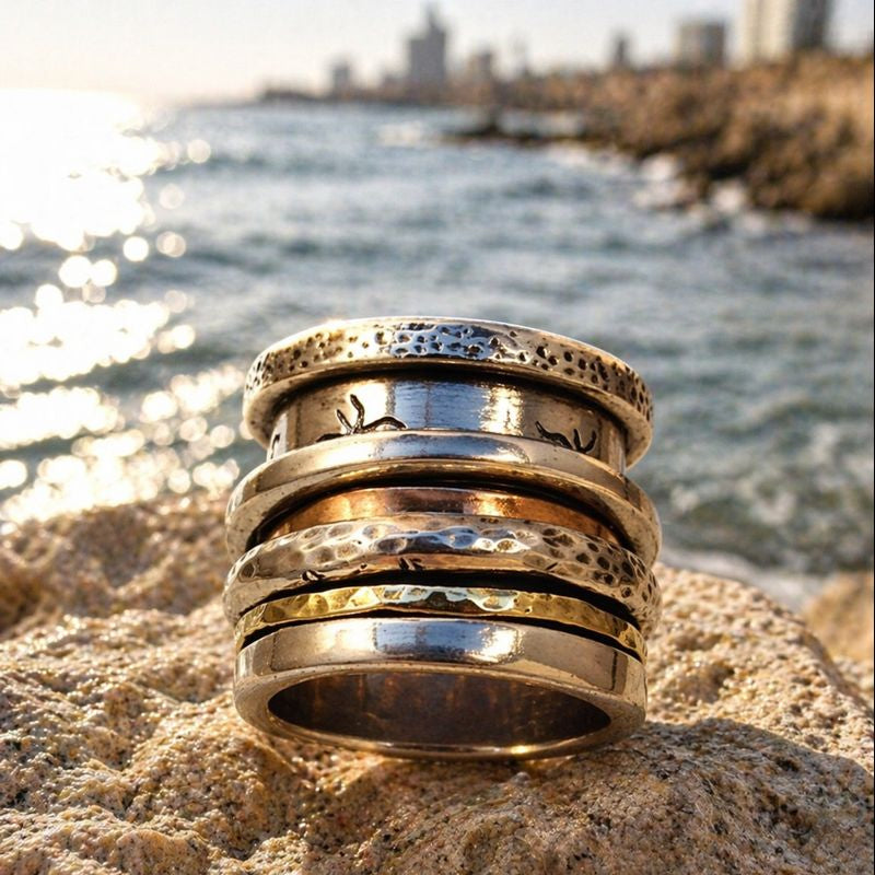 spinner ring by Israeli designers silver and gold in TEl Aviv beach