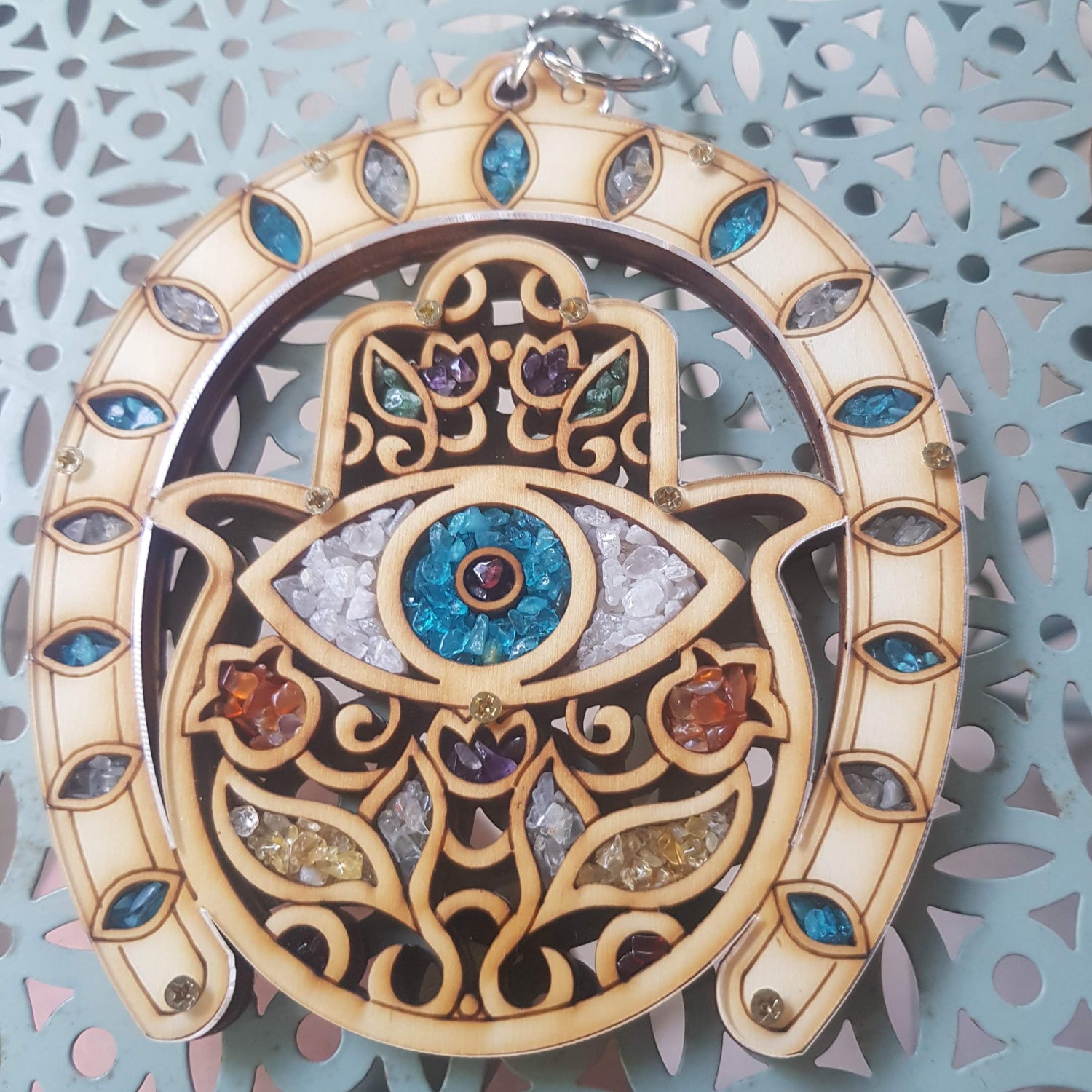 Bluenoemi Jewelry hamsa Horse Shoe Hamsa for home.  Evil Eye symbol and flowers.  Home Blessing Israeli Jewish Gift