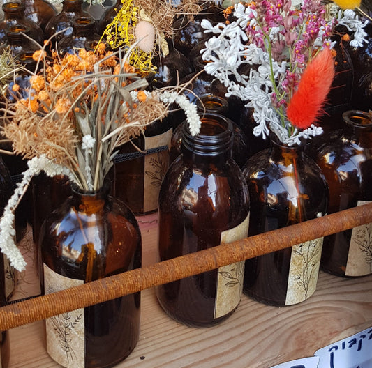 Dried flowers bouquet in a brown vintage glass bottle. - Bluenoemi