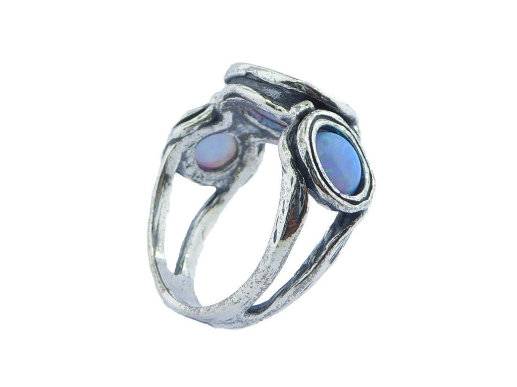 opal rings for women Bluenoemi sterling silver ring for woman. Set with a blue lab opal stone.