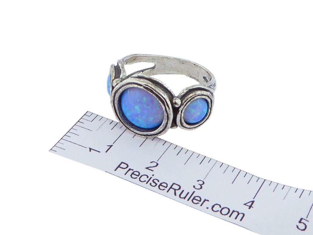 Bluenoemi Jewelry silver ring Bluenoemi sterling silver ring for woman. Israel ring. Set with a blue lab opal stone.