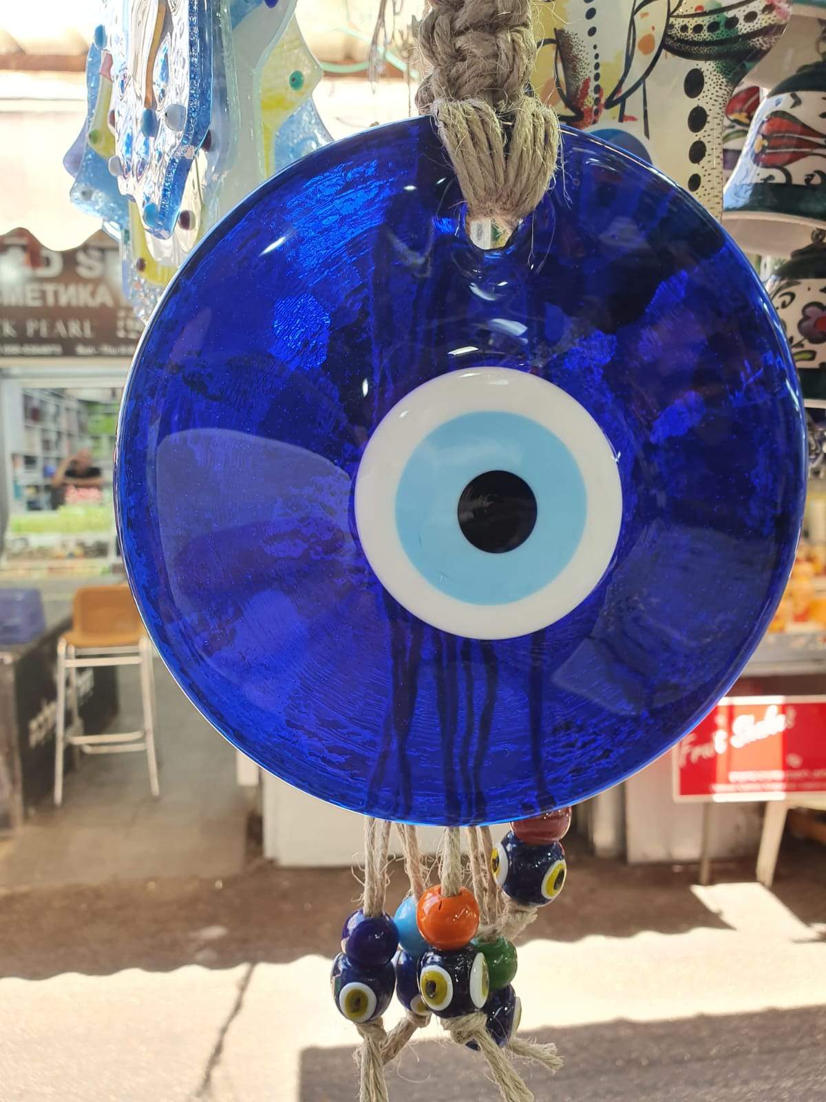 Bluenoemi Jewelry wall hangings Blue Glass Evil Eye Souvenir Luck and Blue Eyes Symbols and beads on a rope.