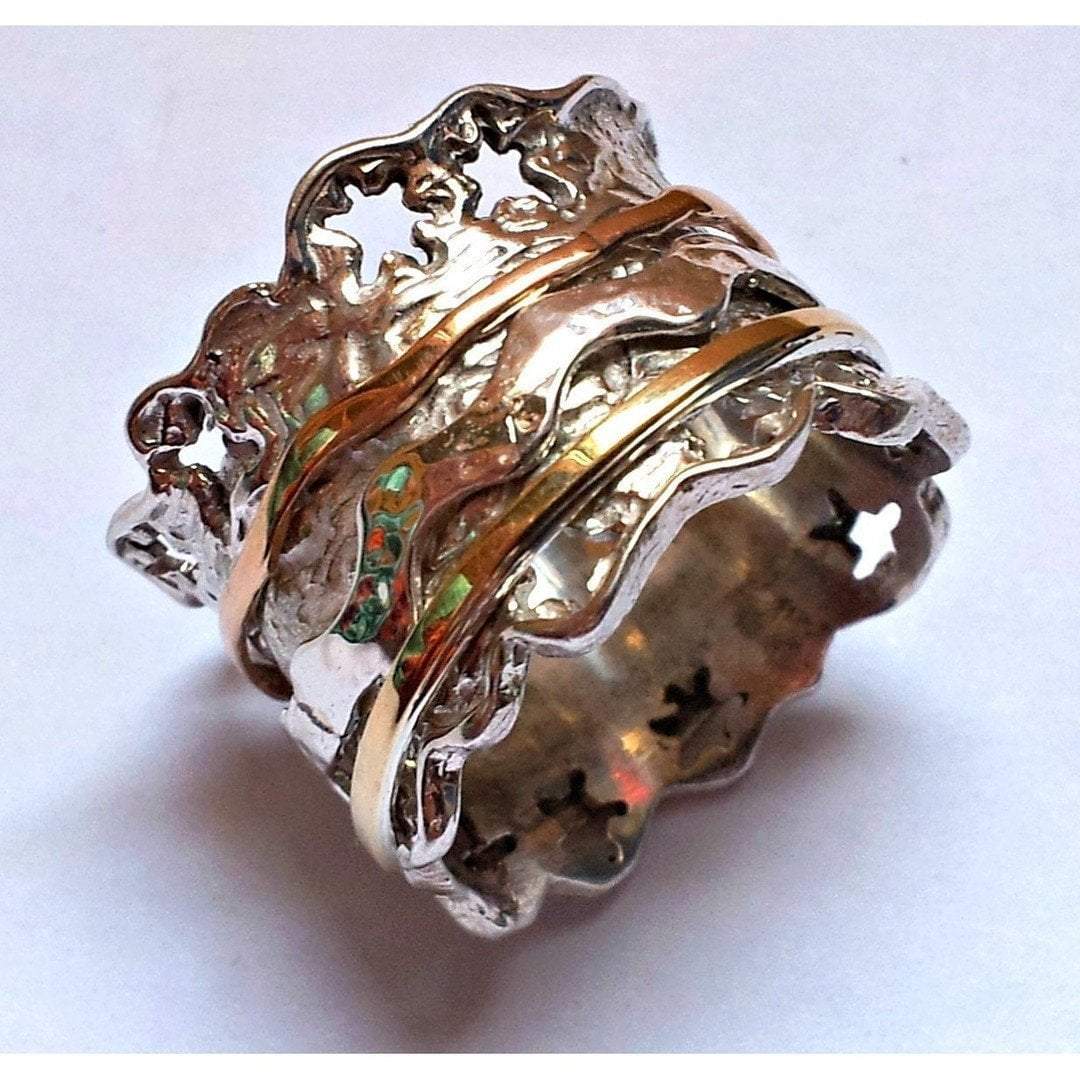 Bluenoemi Rings Spinning ring silver 9 ct gold. Floral spinner meditation ring.