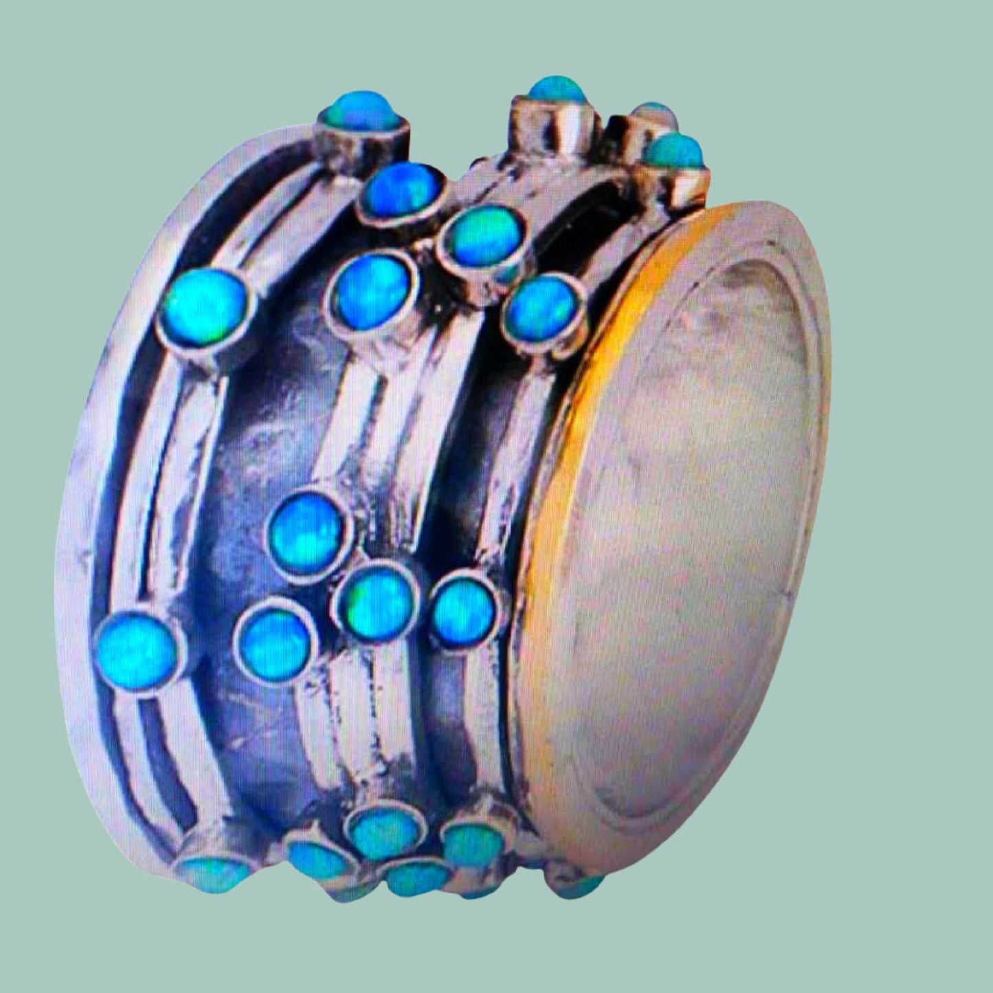 Bluenoemi Spinner Rings Spinner rings meditation rings. Silver gold set with blue opals.